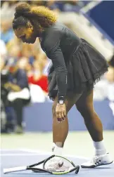  ?? AFP ?? SERENA WILLIAMS of the United States throws her racket to the ground in frustratio­n in the Women’s Singles finals match against Naomi Osaka of Japan.