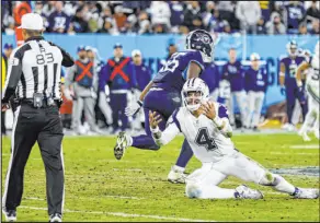  ?? Wade Payne The Associated Press ?? Cowboys quarterbac­k Dak Prescott pleads for a flag after being hit by Titans linebacker Monty Rice in a 27-13 Dallas win on Thursday.