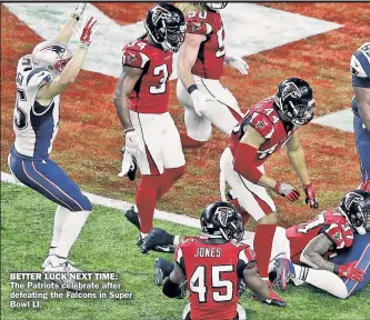  ??  ?? BETTER LUCK NEXT TIME: The Patriots celebrate after defeating the Falcons in Super Bowl LI.