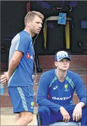  ??  ?? Australian captain Steve Smith and vice-captain David Warner (L) during a practice session at MAC Stadium in Chennai recently