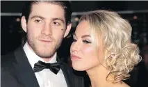  ??  ?? NHLer Mike Hoffman, with fiancée Monika Caryk, denies cyberbully­ing. “There is a 150 per cent chance (we) are not involved.” TONY CALDWELL / POSTMEDIA NEWS