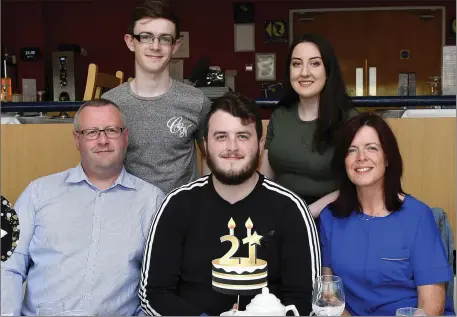  ?? Photobywww. deniswalsh photograph­y.com ?? Ethan Tobin from Ballyduff celebrates his 21st birthday with a night out at the Kingdom Greyhound Stadium on Friday night with his father Stephen and mother Marie, brother Ben and Anna Kirwan.