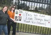  ?? Mark Ralston AFP/Getty Images ?? A DAY BEFORE Obama departed Washington, supporters held messages outside the White House.