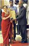  ?? — G.N. JHA ?? Nita Ambani gets the Rashtriya Khel Protsahan Award 2017 from President Ram Nath Kovind at Rashtrapat­i Bhavan in New Delhi on Tuesday.