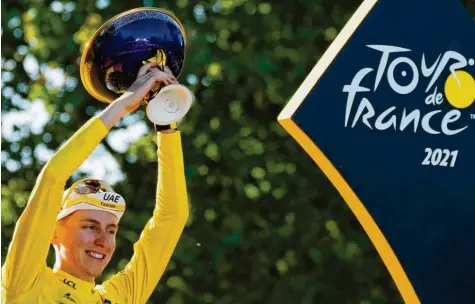  ?? Foto: Christophe Ena, dpa ?? Triumph auf der ganzen Linie: Der Slowene Tadej Pogacar dominierte die Tour de France.