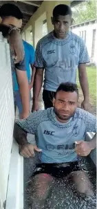  ?? Photo: Luisa Caudre ?? Fiji Airways Fijian 7s captain Seremaia Tuwai(left) and Teri Tamani having an ice bath after the final at the Nabukelevu-i-ra tournament on October 12,2018.