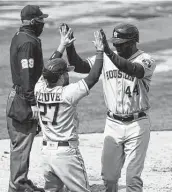  ?? Jeff Chiu / Associated Press ?? Yordan Alvarez (44) scored from first, testing his surgically repaired knees, on Sunday vs. the A’s.