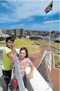  ?? Picture: EUGENE COETZEE ?? AWESOME VIEW: Brazilian tourists Daniela Ciuffo, 7, and her brother Bernardo, 11, take in a bird’s eye view of the Bay from the Donkin Reserve Lighthouse