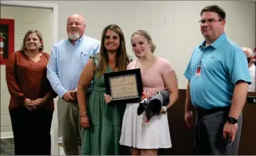  ?? Jeremy stewart ?? Polk County College and Career Academy, and Rockmart High School student Josie Allen (second from right) was recognized at the August meeting of the Polk County Board of Education on Tuesday, Aug. 10, for placing second in the nation in the SkillsUSA compeition for first aid and CPR. Shown with her are Rockmart High School Assistant Principal Shea Floyd (from left), Rockmart High School Principal Bo Adams, PCCCA instructor Brandy Henderson, and PCCCA CEO Gary Morris.