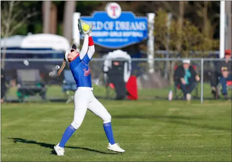  ?? JAMES THOMAS PHOTO ?? Tewksbury center fielder Aislin Davis catches a fly ball during the sixth inning for an out. Central Catholic defeated Tewksbury, 9-6.