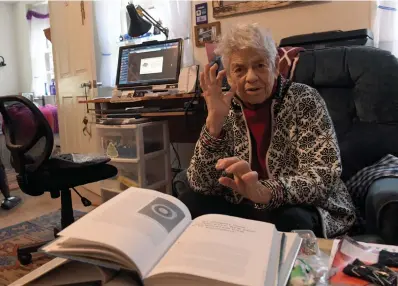  ?? Associated Press ?? ■ Natalie Leduc, bottom left, poses for a portrait in her apartment that was once the Will Rogers Memorial Hospital for tuberculos­is, now converted to a senior living facility.