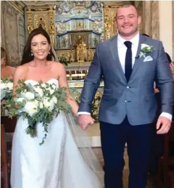  ??  ?? Sinead Corcoran’s father Michael posted this image on Twitter of his daughter at her wedding to Leinster rugby star Jack McGrath in Alvor, Portugal