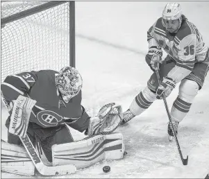  ?? CP PHOTO ?? Montreal Canadiens goaltender Antti Niemi makes a save against New York Rangers’ Mats Zuccarello during NHL action Thursday night in Montreal.