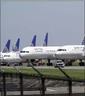  ?? DAVID J. PHILLIP — THE ASSOCIATED PRESS FILE ?? United Airlines planes are parked at George Bush Interconti­nental Airport in Houston.