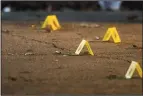  ?? ARMANDO L. SANCHEZ/CHICAGO TRIBUNE ?? A bullet casing sits on the ground at the scene where a person was shot near the intersecti­on of South Hermitage Avenue and West 45th Street on Monday in Chicago, Ill.