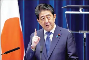  ?? TORU YAMANAKA/AFP ?? Japan’s Prime Minister Shinzo Abe gestures as he speaks during a press conference at his official residence in Tokyo yesterday.