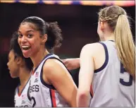  ?? Carmen Mandato / Getty Images ?? Evina Westbrook (22) of the UConn Huskies reacts to a call against the Arizona Wildcats during the first quarter in the Final Four semifinal game of the 2021 NCAA Women’s Tournament at the Alamodome in San Antonio, Texas.