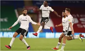  ??  ?? Neeskens Kebano celebrates after grabbing a crucial late second goal for Fulham at Cardiff in the first leg of their Championsh­ip play-off semi-final. Photograph: Naomi Baker/Getty Images