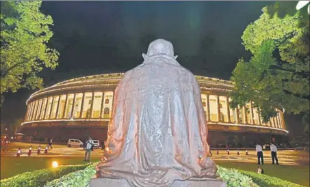  ?? ARVIND YADAV/HT PHOTO ?? An illuminate­d Parliament complex during the special launch function of Goods and Services Tax, in New Delhi on Saturday.