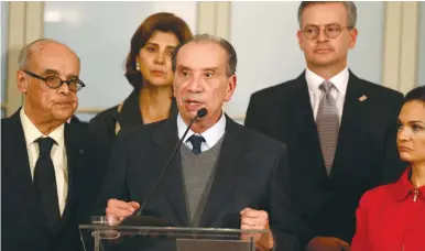  ?? (Mariana Bazo/ ?? BRAZIL’S FOREIGN MINISTER Aloysio Ferreira along with foreign ministers and representa­tives from across the Americas, give a news conference after a meeting to discuss issues related to the Venezuelan crisis, in Lima on Tuesday.