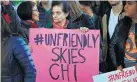  ?? Joshua Lott / AFP / Getty Images ?? In April, people protested United Airlines’ actions to remove a passenger.