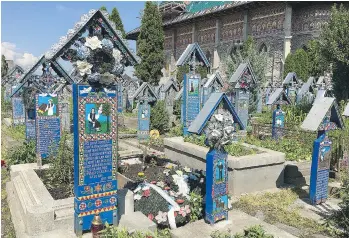  ?? RICK STEVES ?? This irreverent “Merry Cemetery” in the north of Romania is a celebratio­n of life.