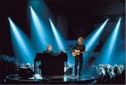  ?? Kevork Djansezian Getty Images ?? ELTON JOHN, left, performed “The A Team” with Ed Sheeran at the Grammy Awards on Feb. 10.