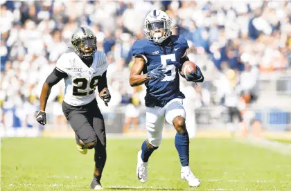  ?? ABBY DREY/TNS ?? Penn State wide receiver Jahan Dotson, a Nazareth High School grad, hauls in a pass for a 72-yard touchdown against Purdue in 2019. Dotson has 92 catches for 1,575 yards (17.1 yards per catch) and 13 touchdowns in his first three seasons at Penn State.