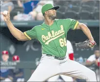  ?? SAM HODDE — THE ASSOCIATED PRESS ?? Relief pitcher Domingo Acevedo has been impressive for Triple-A Las Vegas after struggling with the A’s.