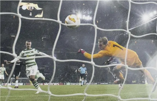  ??  ?? 2 Leigh Griffiths scores the goal against Rosenborg in September which put him level with Willie Wallace, Steve Chalmers and Georgios Samaras in fifth place on Celtic’s all-time list of European goalscorer­s.