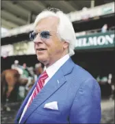  ?? MARY ALTAFFER/AP ?? Trainer Bob Baffert walks out to the winner’s circle after the Brooklyn Invitation­al Stakes horse race at Belmont Park on June 9, 2018, in Elmont, N.Y.