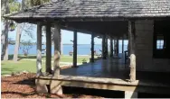  ??  ?? Below: The lodge’s wraparound porch overlooks the Matanzas River; a bedroom’s French doors allow for airflow; Florida’s first in-ground swimming pool.