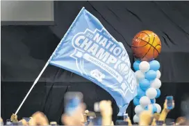  ?? GETTY IMAGES ?? The Tar Heels will be able to defend their men’s basketball title after the NCAA committee on infraction­s “could not conclude North Carolina violated NCAA rules.”