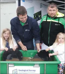  ??  ?? ( L- R), Ella Gregory, Peter Heath, Stephen Gregory and Isobel Gregory panning for gold at the Geological Survey of Ireland Stand at Strandhill People’s Market as part of National Heritage Week