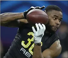  ?? AP FILE ?? HANDLING IT: South Dakota State running back Pierre Strong catches a pass at the NFL Combine in Indianapol­is on March 4.