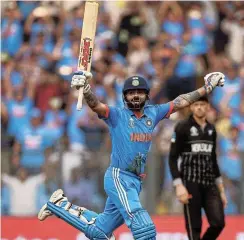  ?? Picture: Robert Cianflone/Getty Images ?? Virat Kohli of India celebrates after scoring a century during the ICC Men's Cricket World Cup India 2023 Semifinal match against New Zealand at Wankhede Stadium.