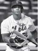  ??  ?? Yoenis Cespedes is staying with the New York Mets after testing the free-agency waters.