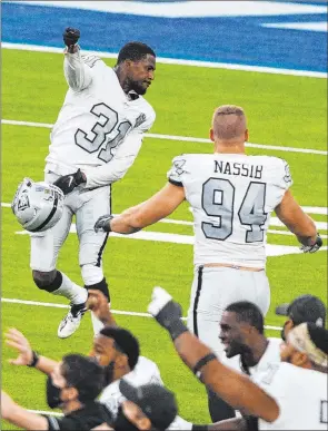  ?? Heidi Fang Las Vegas Review-journal @Heidi Fang ?? Cornerback Isaiah Johnson (31) celebrates his stop of Chargers’ tight end Donald Parham to secure the Raiders’ 31-26 win at Los Angeles on Sunday.