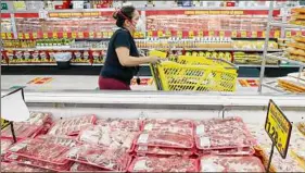  ?? LM Otero / Associated­press ?? Wholesale prices, boosted by rising food costs, increased 0.8 percent in May, and are up by a record amount over the past year, another indication that inflation pressures are rising since the economy has begun to re-open.