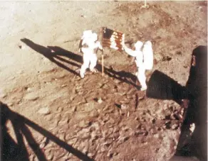  ?? NASA ?? Neil Armstrong and Buzz Aldrin placed a U.S. flag on the surface of the moon on July 20, 1969 — a defining moment for humanity.