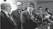  ?? AFP ?? Axed Catalan president Carles Puigdemont (C) gives a press conference on Friday in Brussels, a day after the Catalonia's regional election.