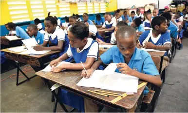  ?? FILE ?? Windward Road Primary students sitting performanc­e task for the Primary Exit Profile mock exam on Monday, June 18. Boys are at a disadvanta­ge, both physiologi­cally and psychologi­cally, in the education system, writes Peter Espeut.