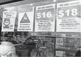  ?? NAM Y. HUH/AP FILE ?? Experts say employers across the country are becoming more transparen­t about pay in order to stay competitiv­e with companies in states that require posting of salary ranges.