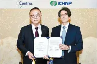  ?? Courtesy of KHNP ?? Korea Hydro & Nuclear Power (KHNP) CEO Whang Joo-ho, left, poses with Centrus Energy CEO Amir Vexler, after signing a letter of intent in Washington, D.C., Monday (local time).