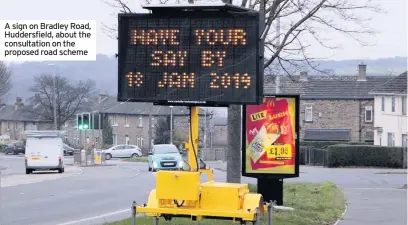  ??  ?? A sign on Bradley Road, Huddersfie­ld, about the consultati­on on the proposed road schemeLoca­l Democracy Reporter