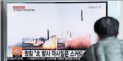  ?? LEE JIN-MAN/AP ?? A viewer in South Korea watches a news channel Tuesday showing images of North Korea’s ballistic missile launch.