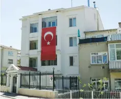  ??  ?? TURKEY’S NATIONAL flag hangs on the facade of a girls dormitory in Ankara that was sealed by Turkish authoritie­s last month over alleged links to the followers of US-based cleric Fethullah Gulen.