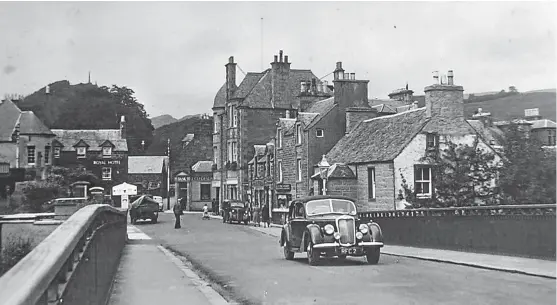  ??  ?? Dalginross Bridge at Comrie as a an Alvis car with personalis­ed number plates crosses in the late 1950s.