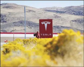  ?? ASSOCIATED PRESS ?? In this Oct. 13 file photo, a sign marks the entrance to the Tesla Gigafactor­y in Sparks, Nev.