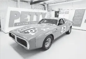  ?? THE ASSOCIATED PRESS ?? Richard Petty’s iconic 1974 Dodge Charger is going on sale, along with some of his other cars, one of his Daytona 500 trophies and other items.